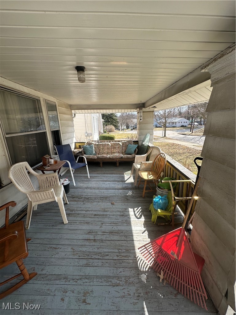 757 Noah Avenue Akron, OH 44320 - Photo 4 of 16 Wooden terrace with covered porch