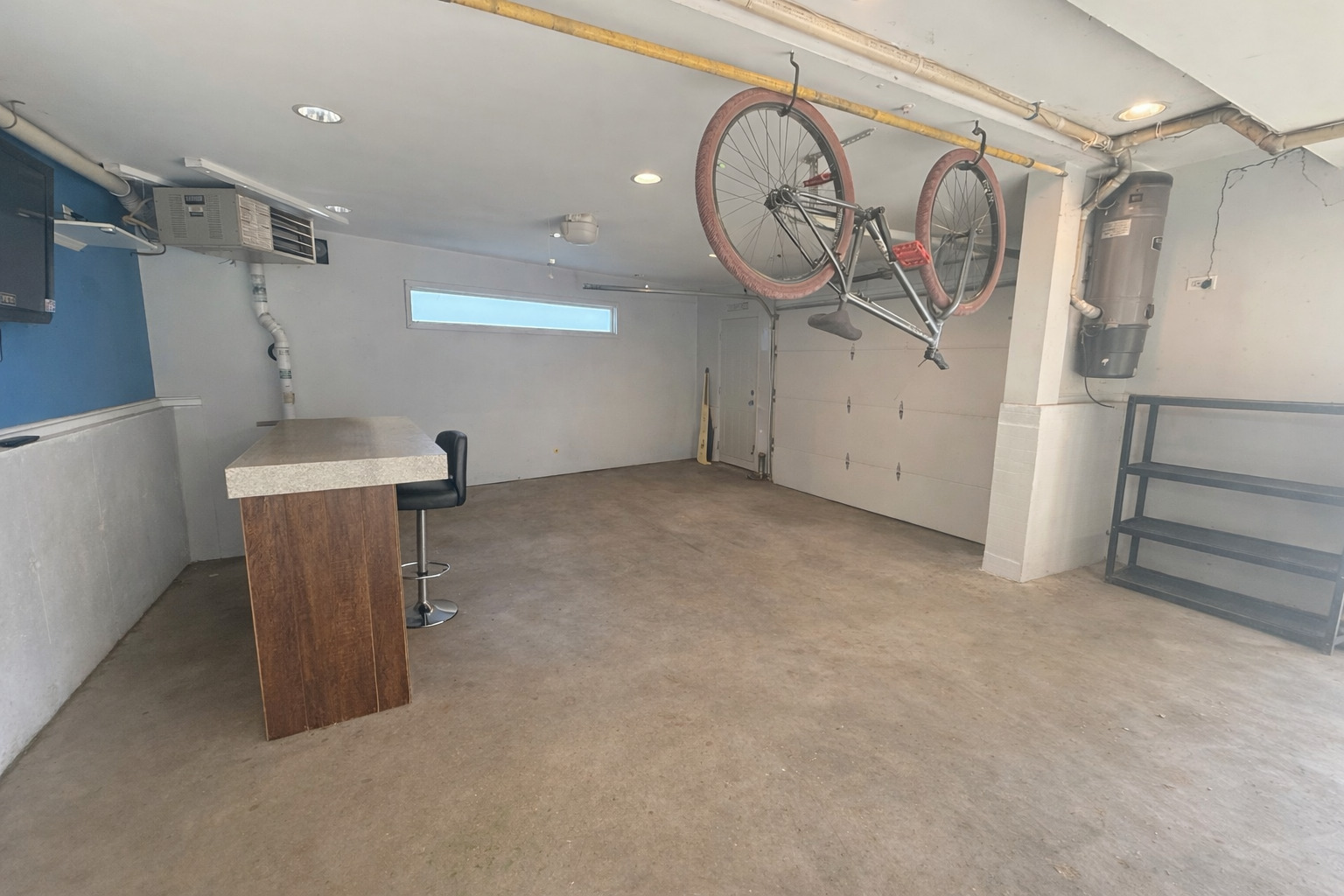 8313 Garrison Road Wonder Lake, IL 60097 - Photo 14 of 23 a view of a storage & utility room with racks on the wall