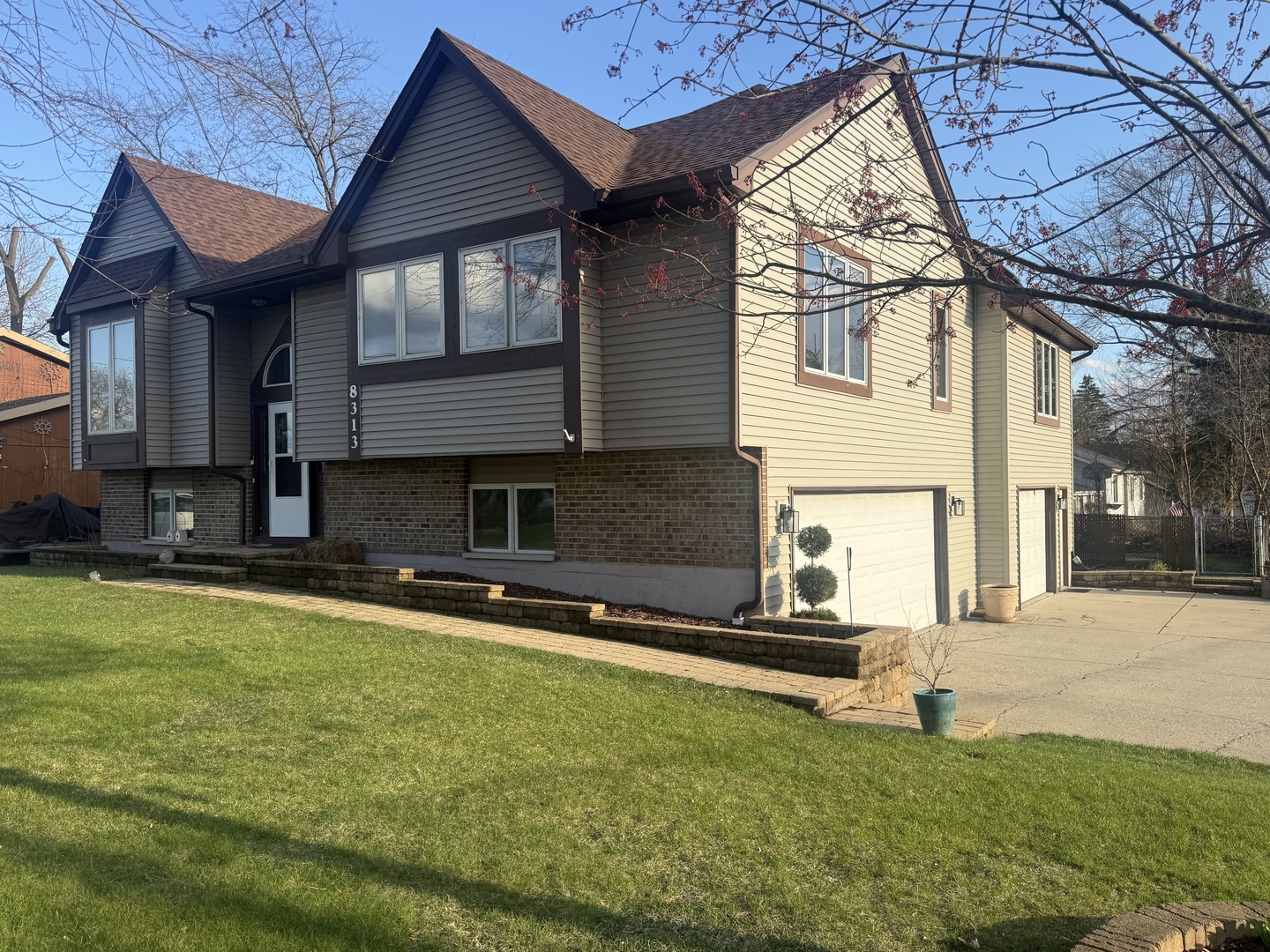 8313 Garrison Road Wonder Lake, IL 60097 - Photo 18 of 23 a view of a house with a swimming pool