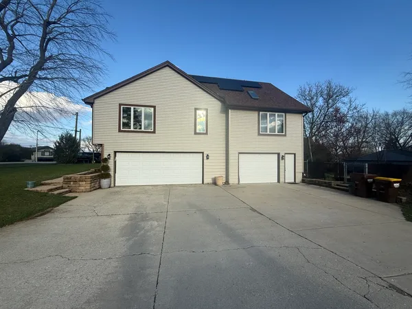 a view of house and yard