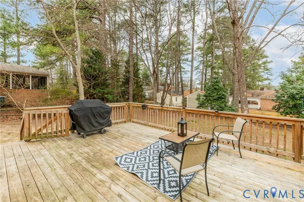 a blue bench sitting in front of a house