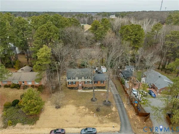 an aerial view of residential house with outdoor space
