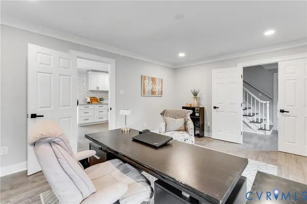 a living room with furniture and a table