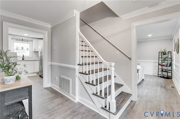 a view of entryway with wooden floor