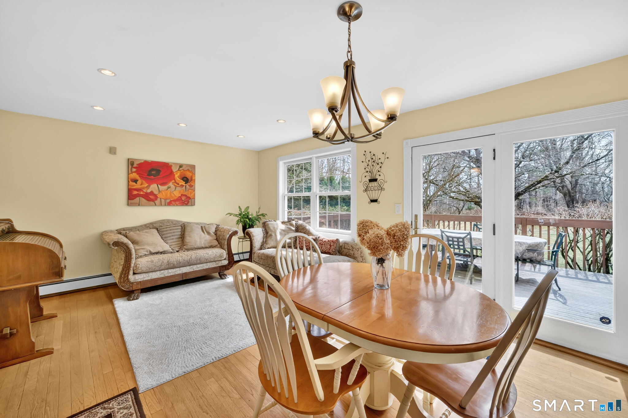 20 Kitcher Court Trumbull, CT 06611 - Photo 16 of 39 a living room with furniture a window and a chandelier