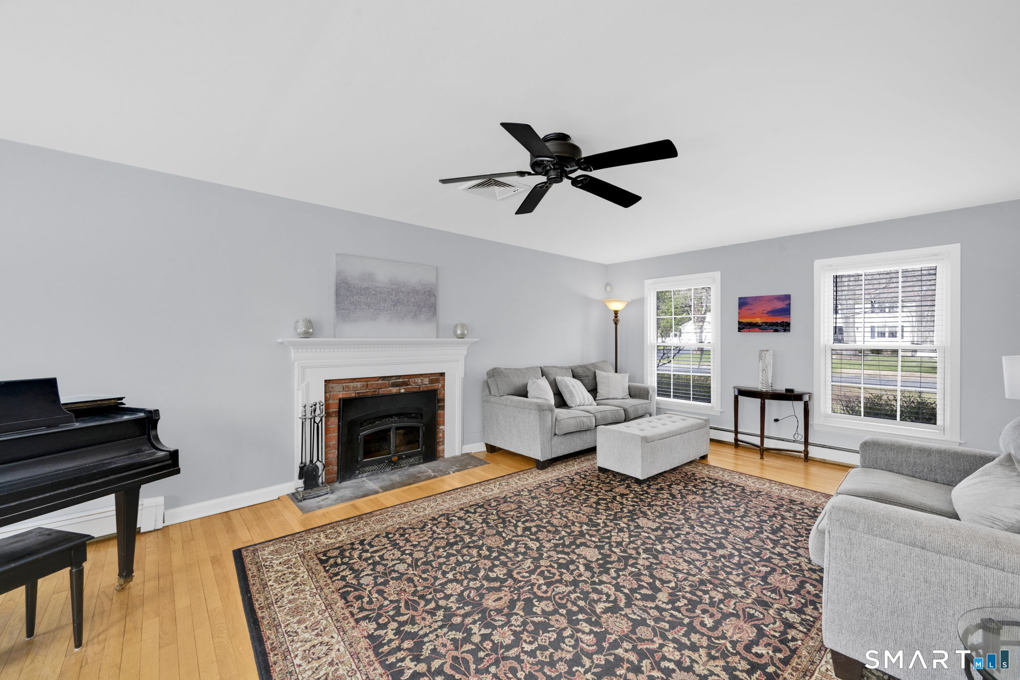 20 Kitcher Court Trumbull, CT 06611 - Photo 21 of 39 a living room with furniture and a fireplace