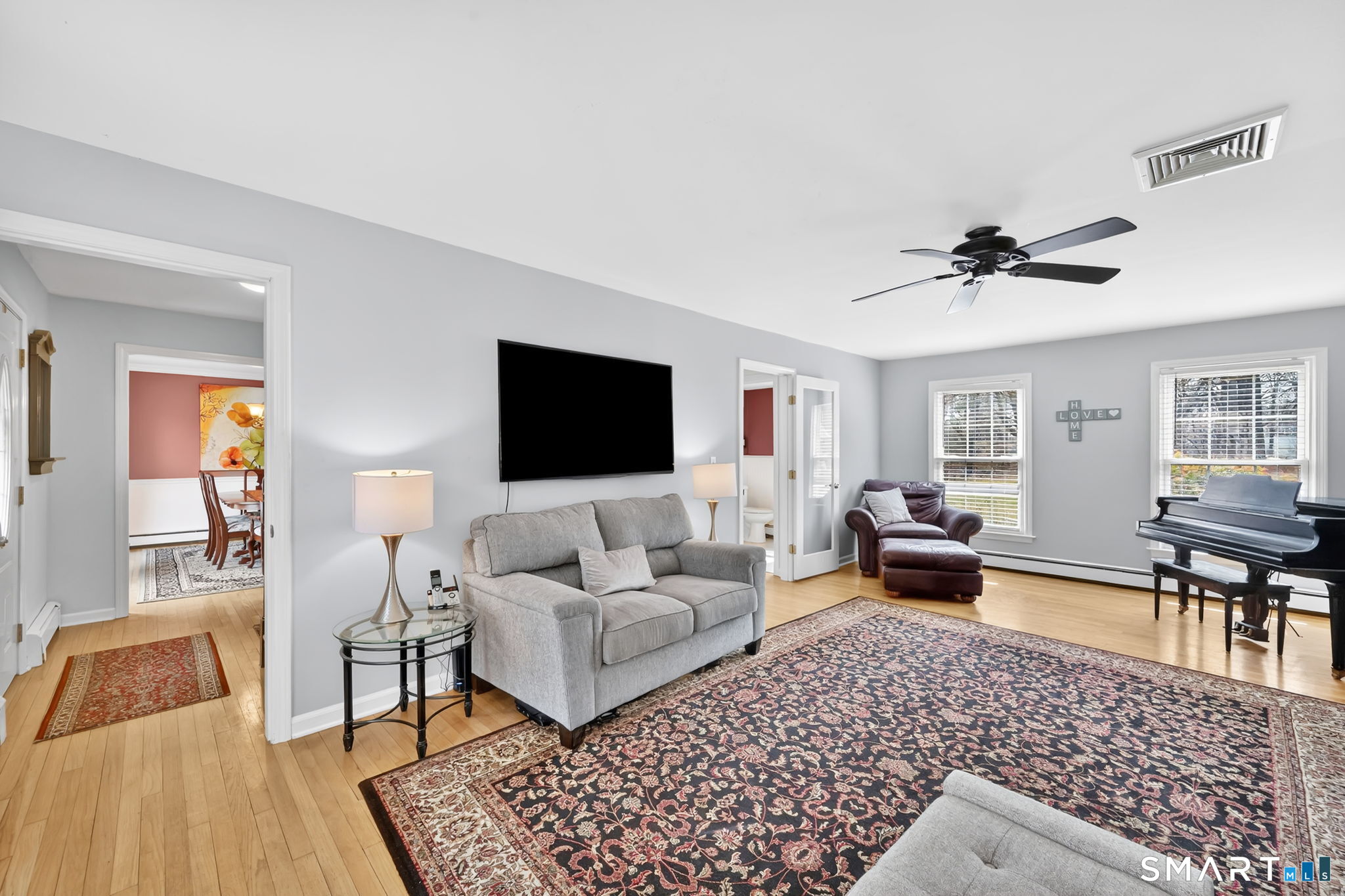 20 Kitcher Court Trumbull, CT 06611 - Photo 22 of 39 a living room with furniture and a flat screen tv
