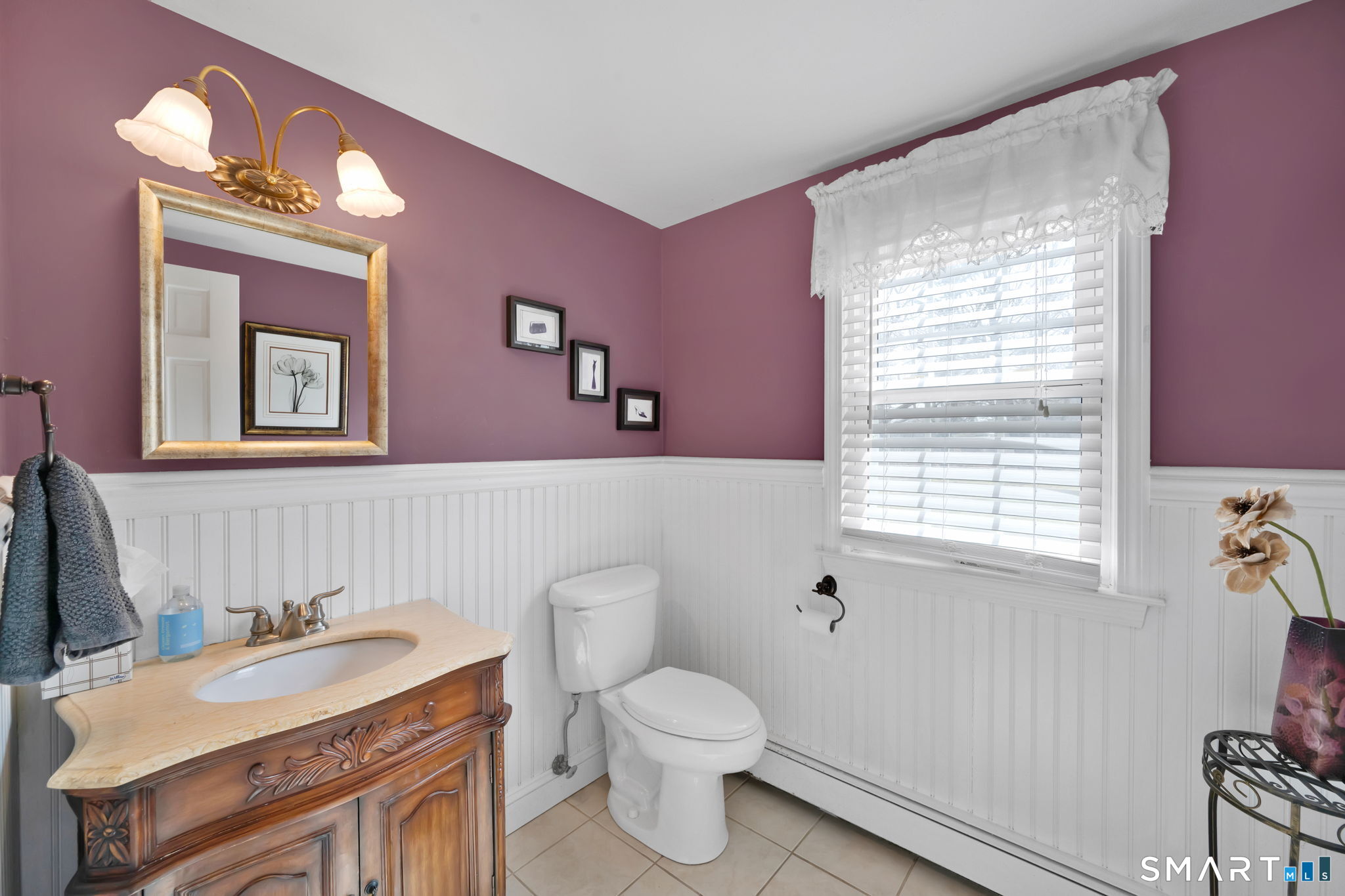 20 Kitcher Court Trumbull, CT 06611 - Photo 25 of 39 a bathroom with a granite countertop toilet sink and mirror