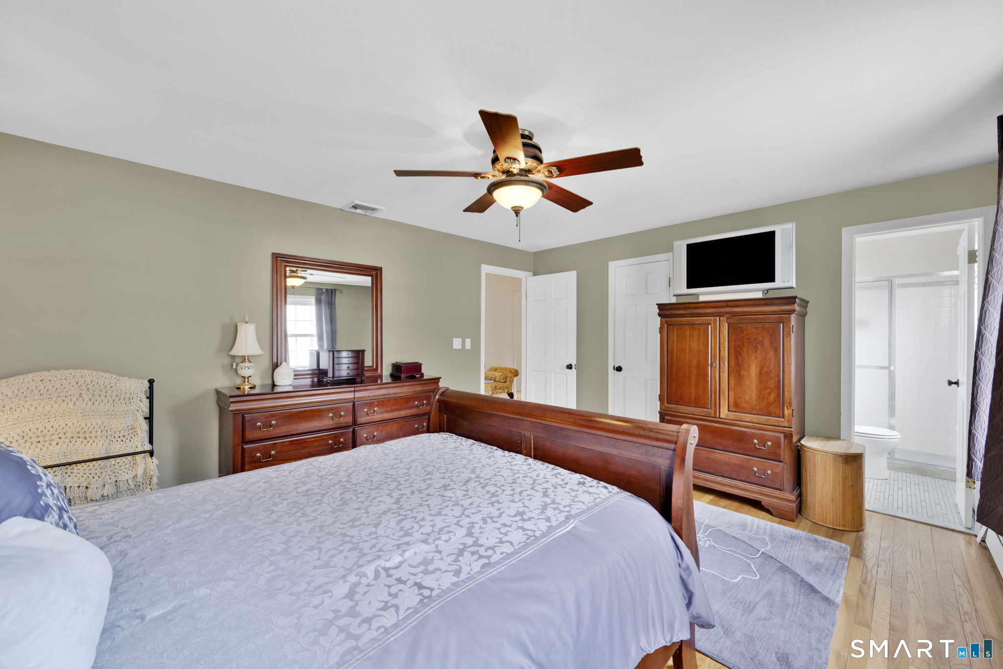 20 Kitcher Court Trumbull, CT 06611 - Photo 27 of 39 a bedroom with a bed and a dresser in it