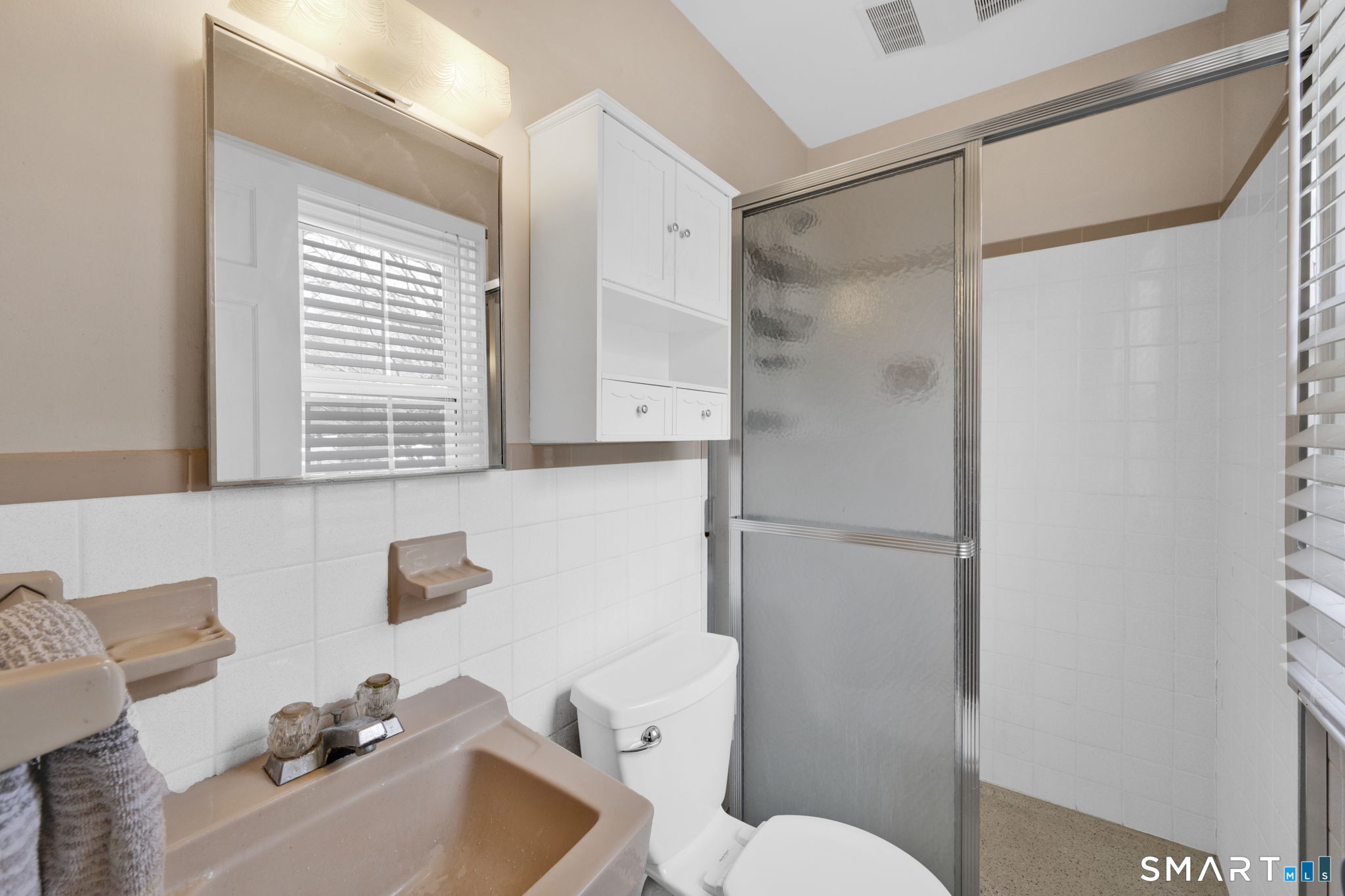 20 Kitcher Court Trumbull, CT 06611 - Photo 28 of 39 a bathroom with a sink mirror toilet and shower