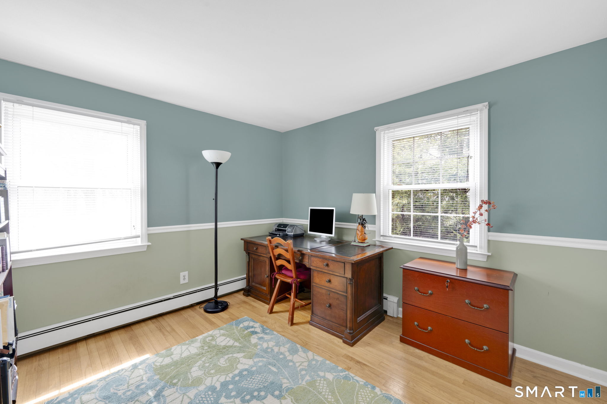 20 Kitcher Court Trumbull, CT 06611 - Photo 31 of 39 a view of a workspace with furniture and a window