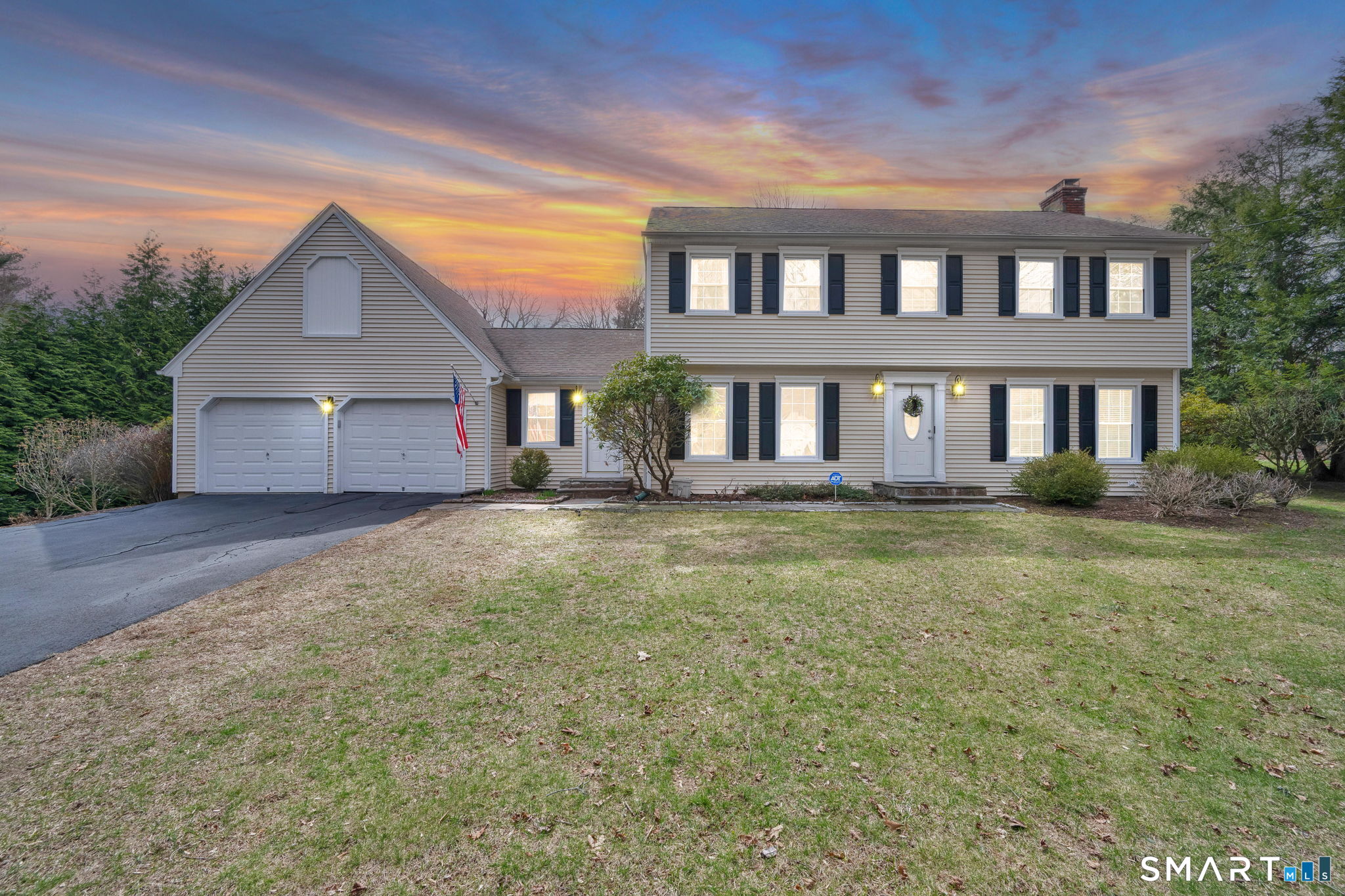 20 Kitcher Court Trumbull, CT 06611 - Photo 6 of 39 a front view of a house with a yard and trees