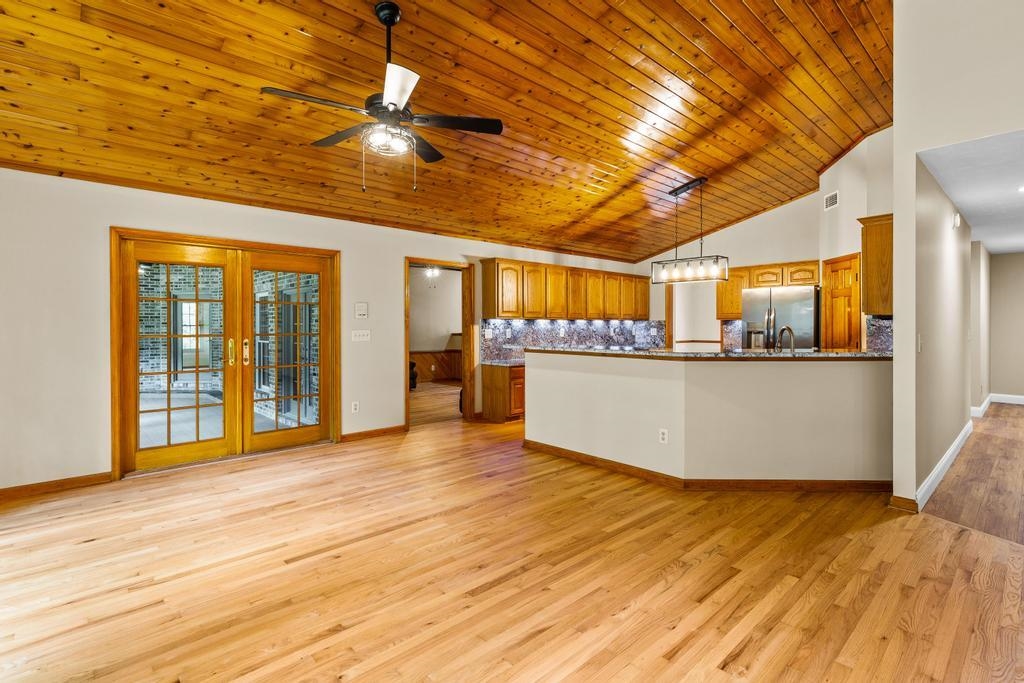 2005 Bennett Road St. Augustine, FL 32092 - Photo 33 of 95 a view of a big room with wooden floor and windows