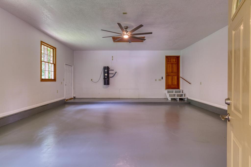 2005 Bennett Road St. Augustine, FL 32092 - Photo 50 of 95 an empty room with a window and ceiling fan
