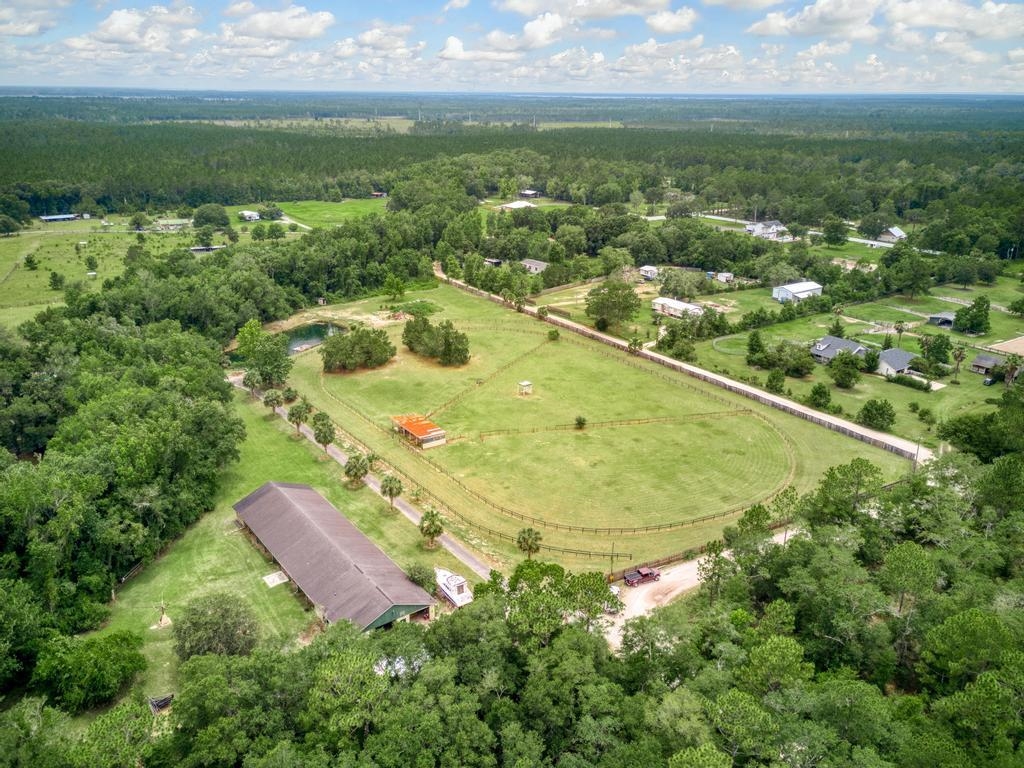 2005 Bennett Road St. Augustine, FL 32092 - Photo 95 of 95 an aerial view of residential houses with outdoor space and trees