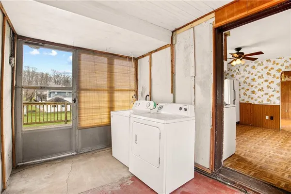 a view of a bathroom from a hallway