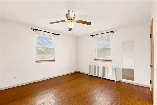 a view of a bathroom with shower and stairs