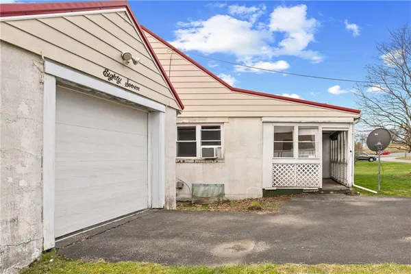 a front view of a house with a garage