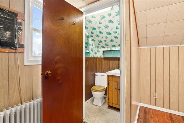 a view of an empty room with stairs