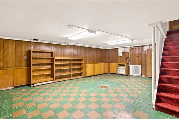 a view of an empty room with stairs