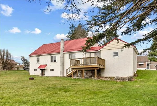 an aerial view of residential building and ocean