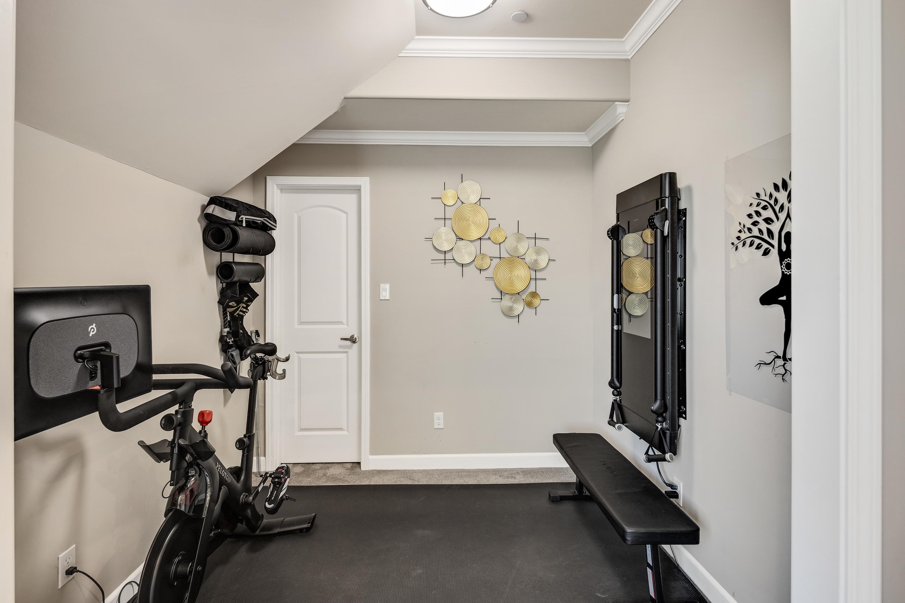 35 Spruce Valley Lane Piperton, TN 38017 - Photo 24 of 39 a view of a room with gym equipment