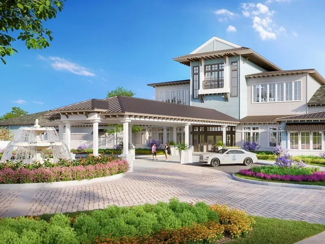 a front view of building with an outdoor space and lakeside