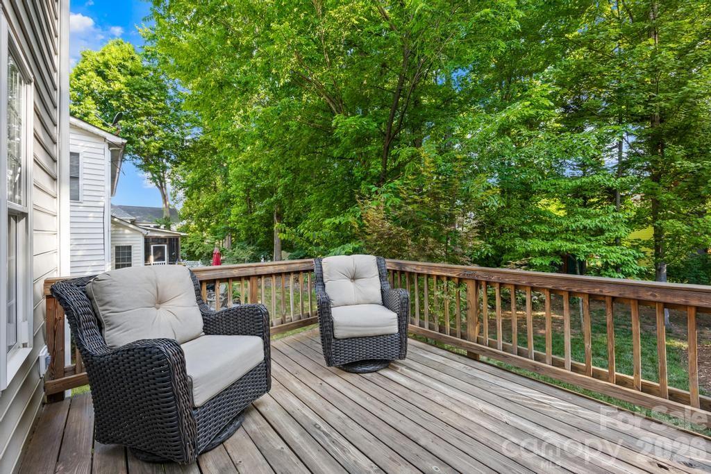 17028 Hampton Trace Road Huntersville, NC 28078 - Photo 32 of 41 a balcony with wooden floor and outdoor seating