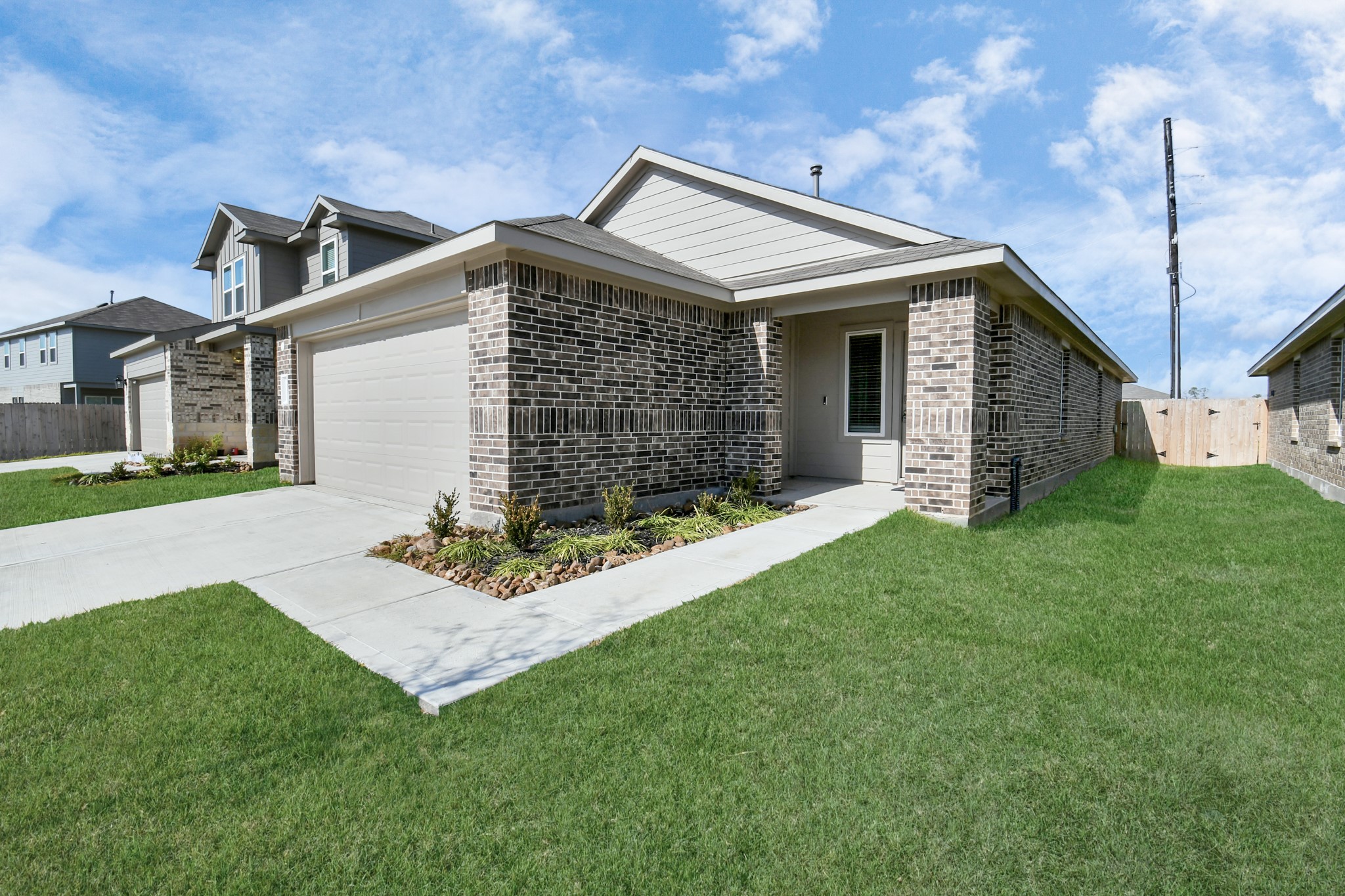 5315 Castlebury Meadows Dr Spring Spring, TX 77373 - Photo 2 of 39 a front view of house with yard