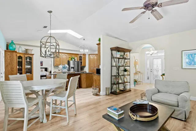 a view of a livingroom with furniture and a chandelier