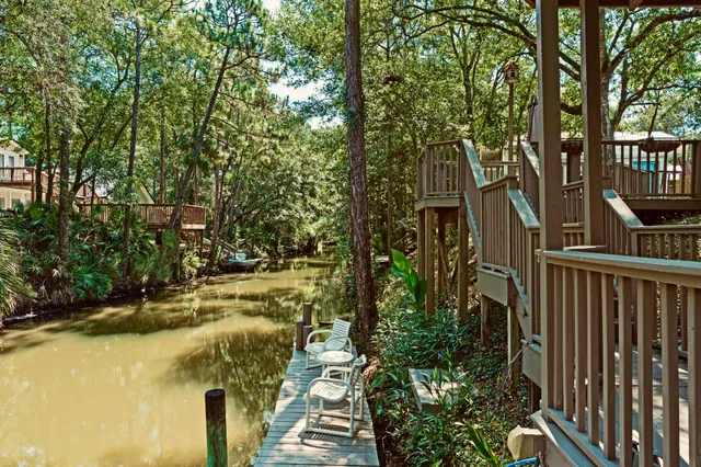 a view of swimming pool from a balcony