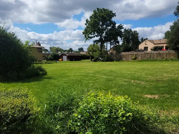 a view of a house with a big yard