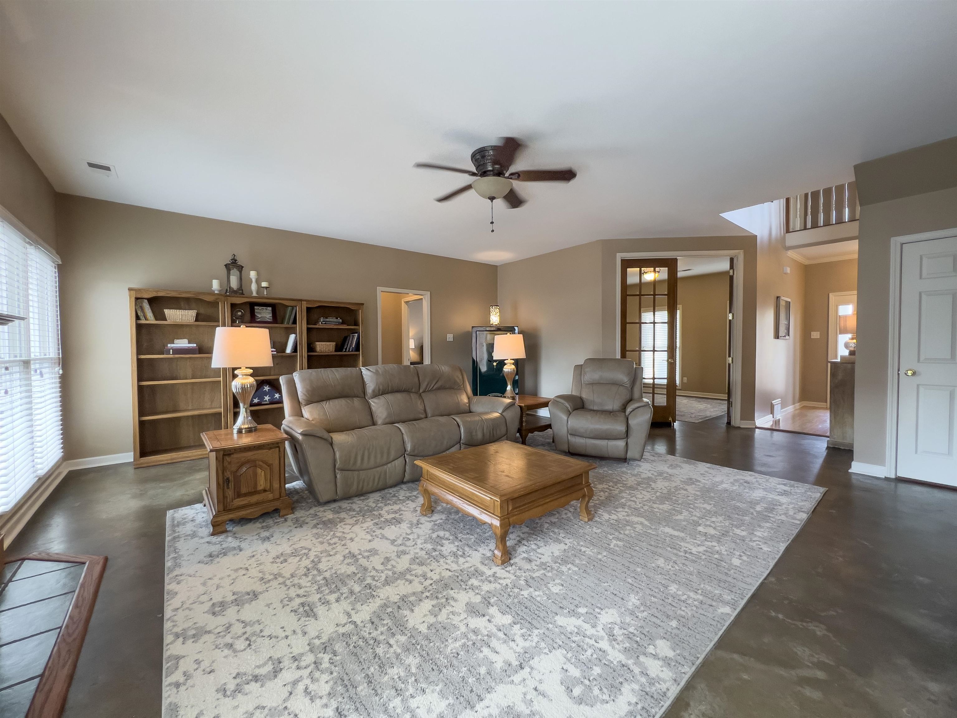 747 Steeple Ridge Cove Collierville, TN 38017 - Photo 6 of 39 a living room with furniture and wooden floor