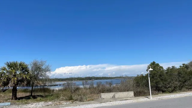 a view of a lake with a mountain in the background