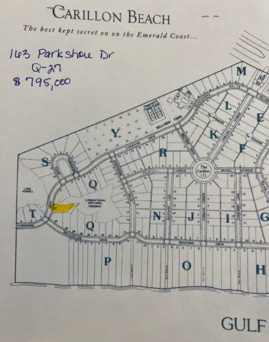 a view of a room with a white fence