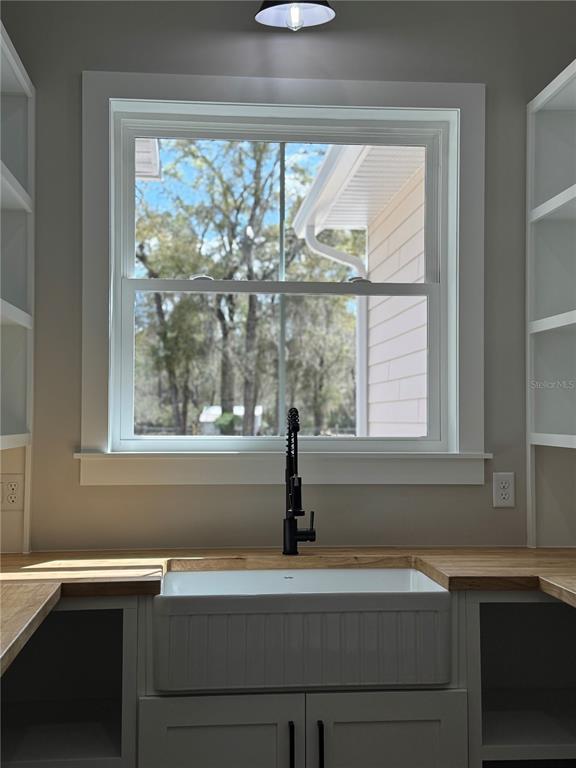 5151 Northwest 73rd Street Chiefland, FL 32626 - Photo 27 of 58 a view of a sink and a window