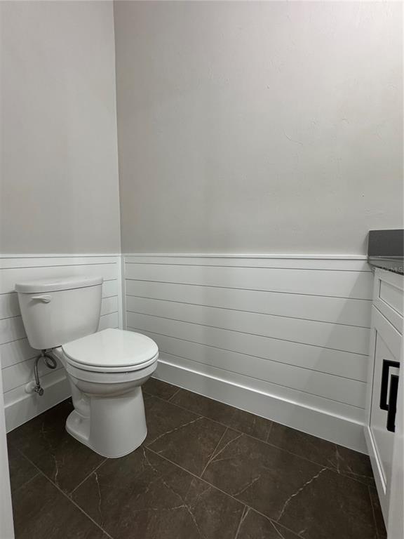 5151 Northwest 73rd Street Chiefland, FL 32626 - Photo 35 of 58 a bathroom with a toilet and a shower