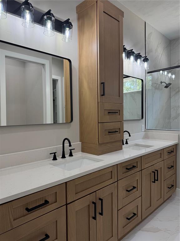 5151 Northwest 73rd Street Chiefland, FL 32626 - Photo 41 of 58 a bathroom with a double vanity sink and mirror