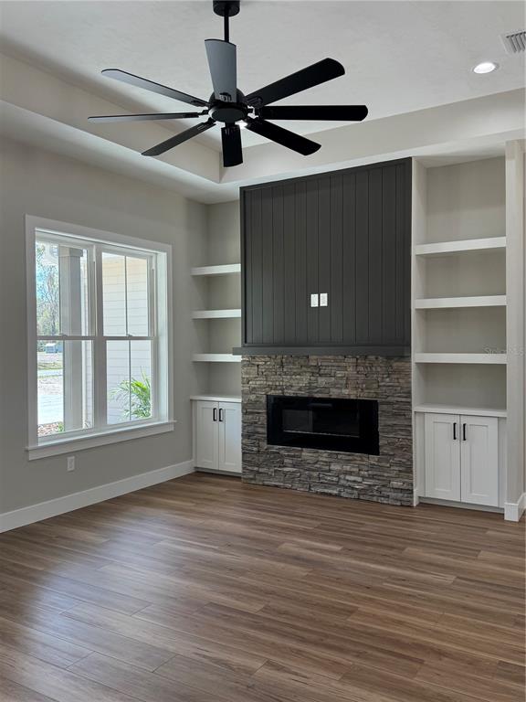 5151 Northwest 73rd Street Chiefland, FL 32626 - Photo 9 of 58 a view of an empty room with a fireplace and a window