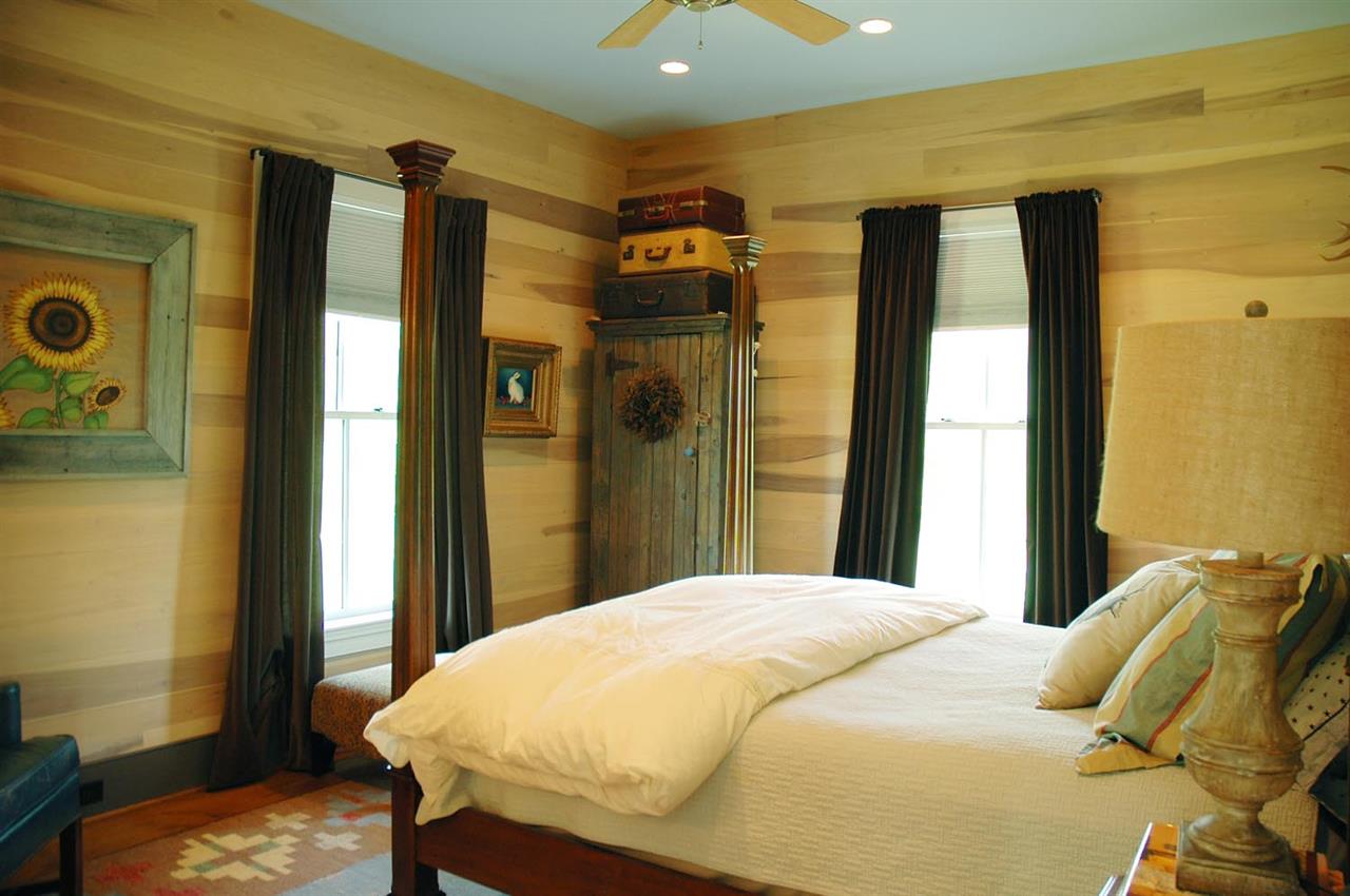 4981 Laurel Road Shipman, VA 22971 - Photo 17 of 34 a bedroom with a bed and wooden floor
