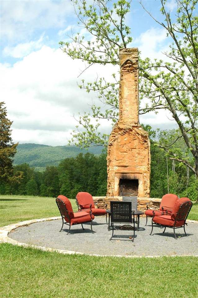 4981 Laurel Road Shipman, VA 22971 - Photo 25 of 34 a view of a patio with a table and chairs