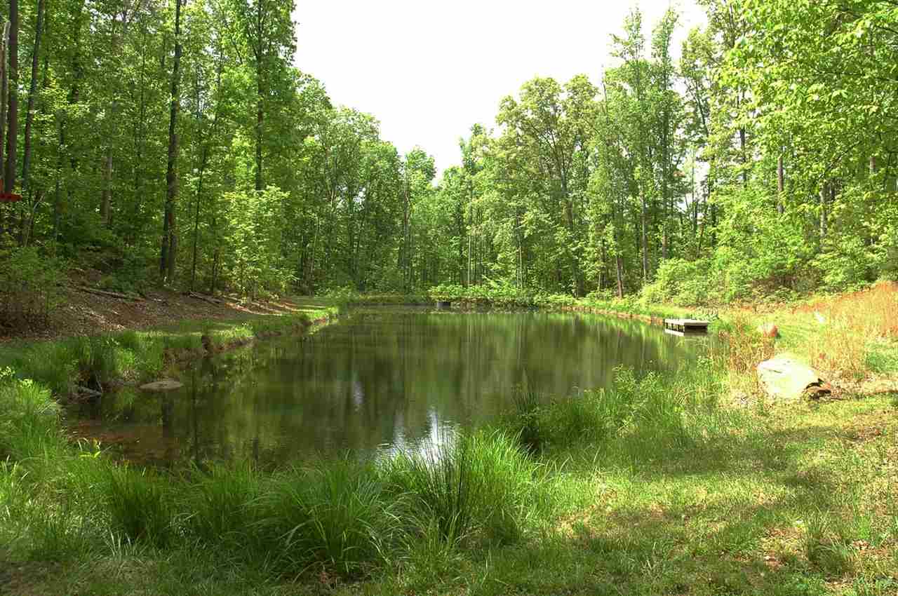 4981 Laurel Road Shipman, VA 22971 - Photo 28 of 34 a view of a lake with a yard
