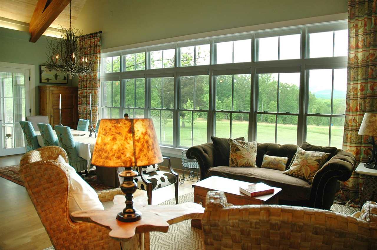 4981 Laurel Road Shipman, VA 22971 - Photo 10 of 34 a living room with furniture and floor to ceiling windows