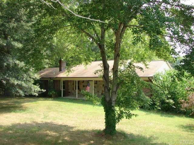 4812 Bahama Road Rougemont, NC 27572 - Photo 1 of 8 a view of a house with swimming pool and sitting area