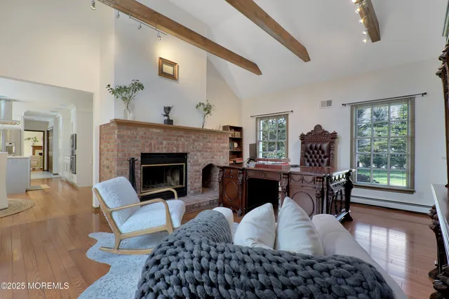 a view of entryway with wooden floor