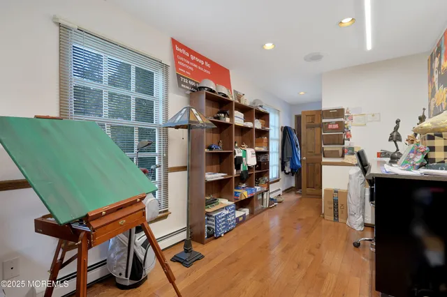 a view of a hallway with windows
