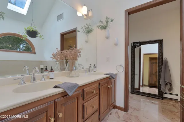 a car parked in front of white house