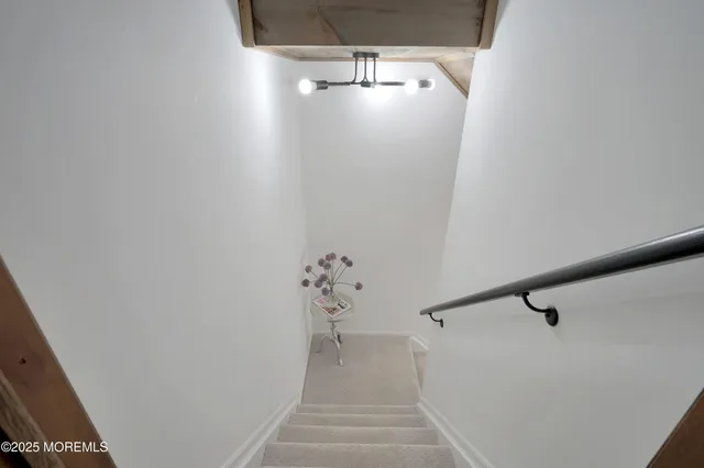 a view of a backyard with sitting area