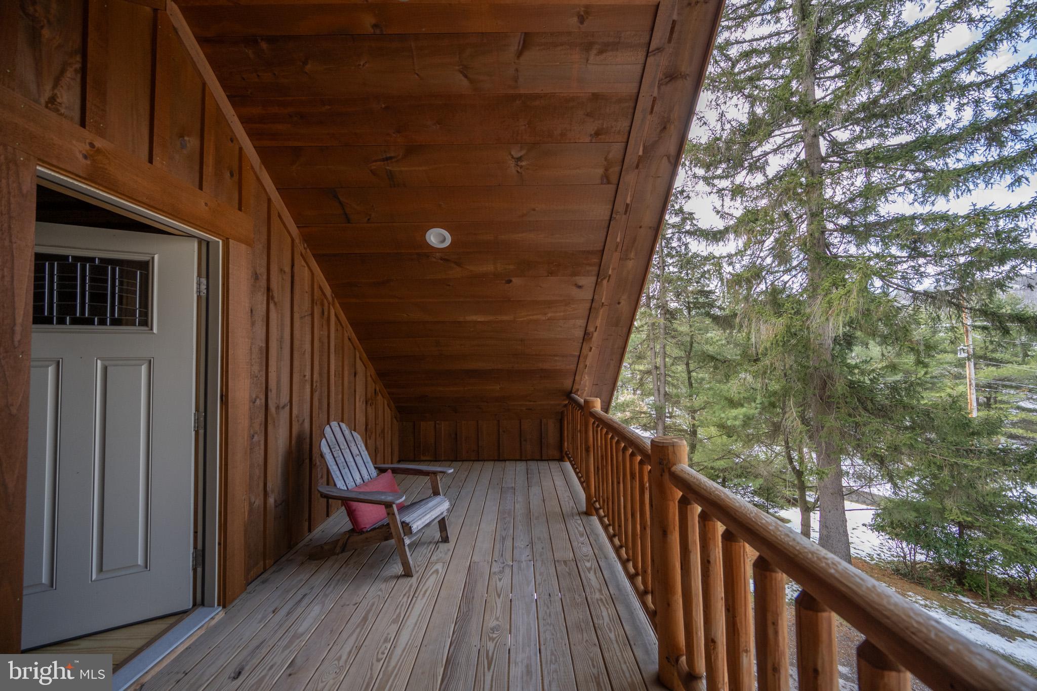 88 Gravelly Run Road McHenry, MD 21541 - Photo 49 of 79 a view of balcony with wooden floor and fence