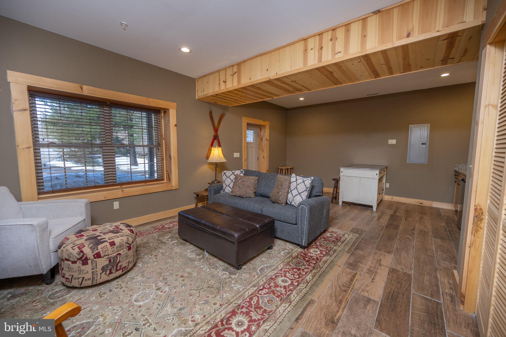 88 Gravelly Run Road McHenry, MD 21541 - Photo 52 of 79 a living room with furniture and a window